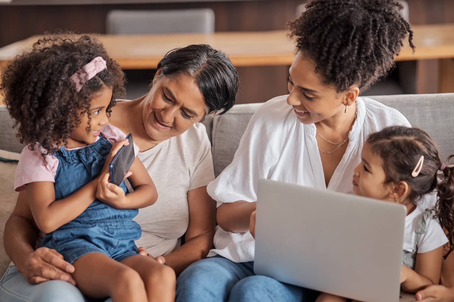 Woman and her children sat with travel nanny